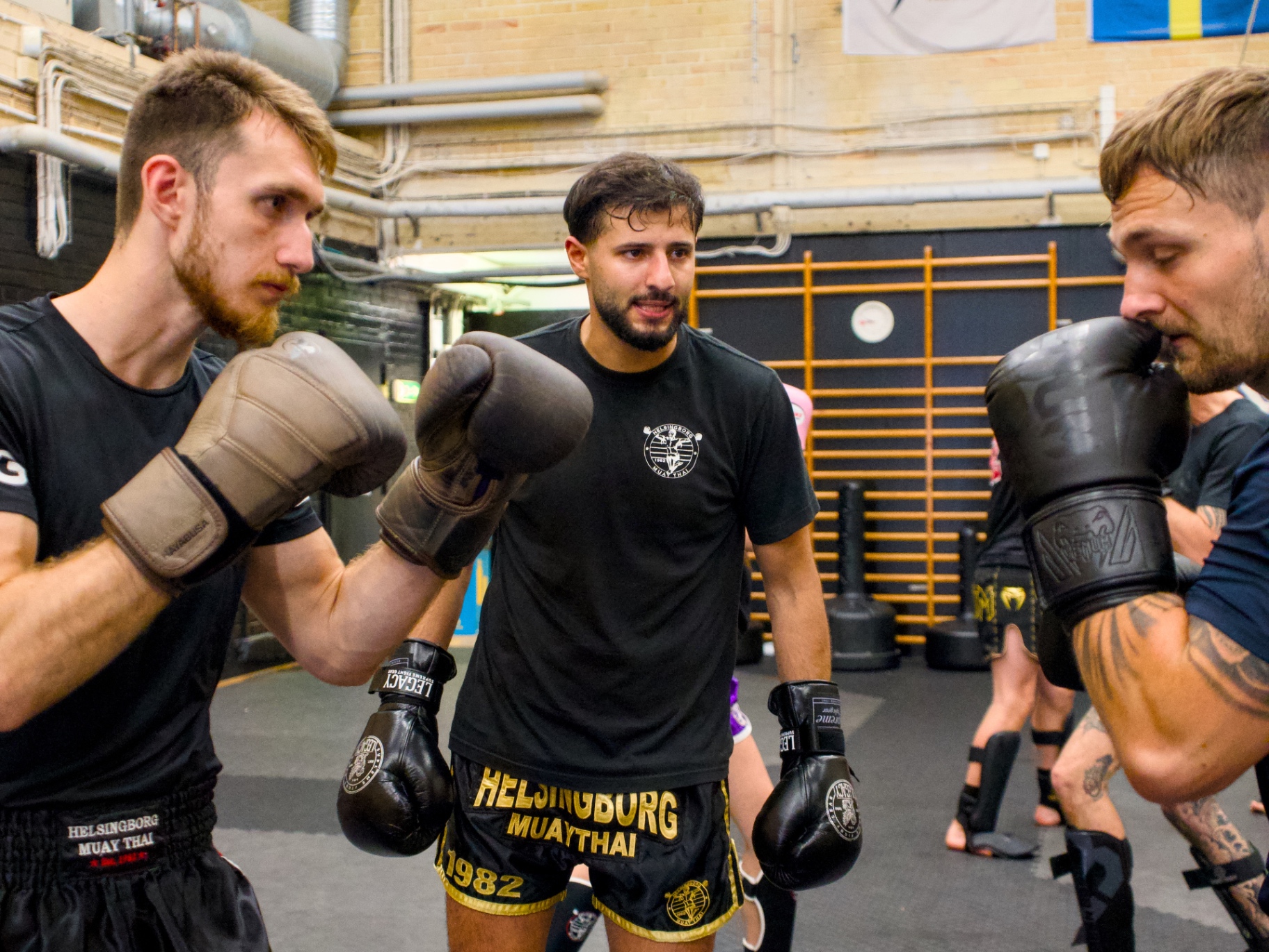 Fighters facing off with gloves up at Helsingborg Muay Thai