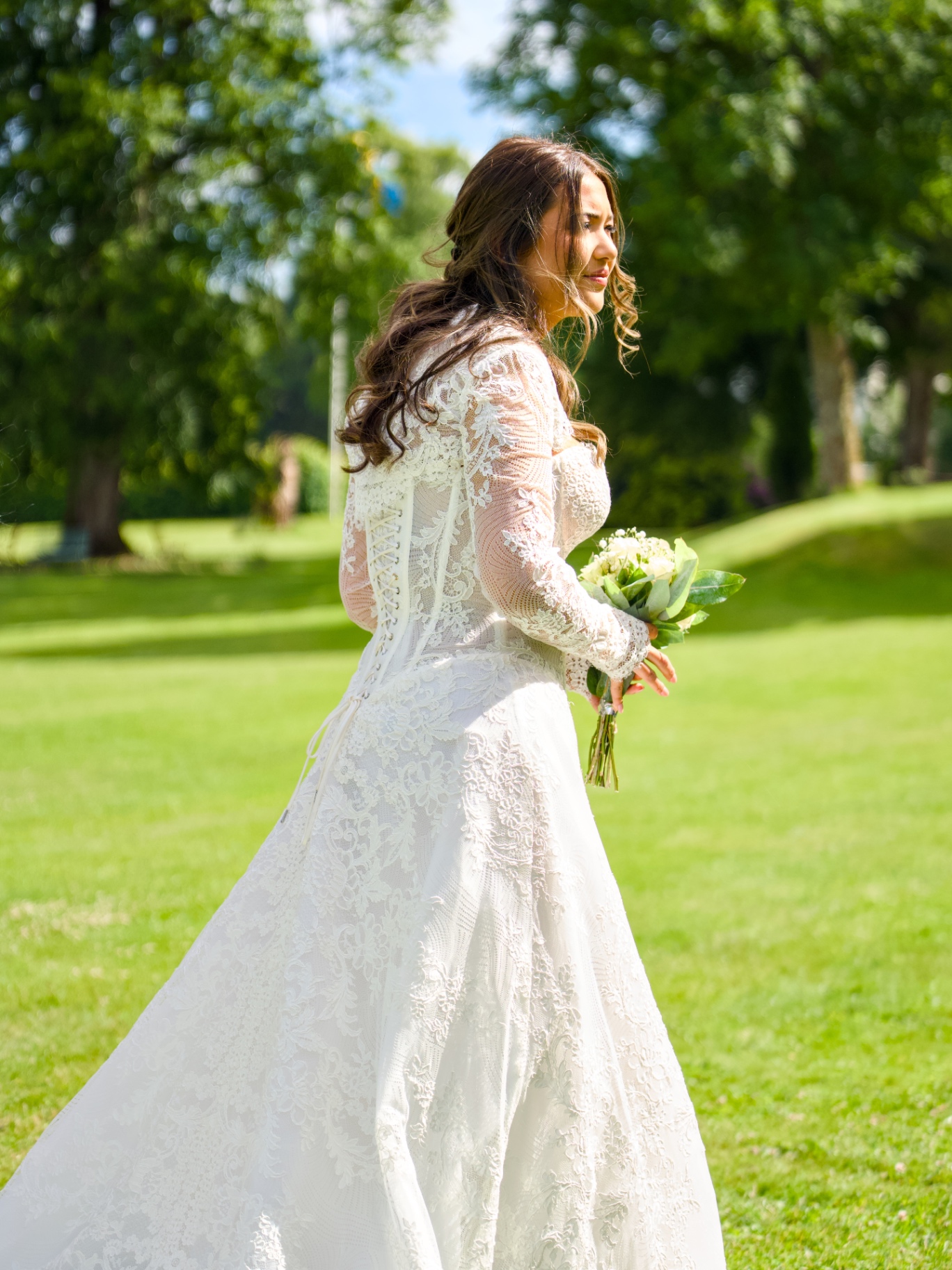 Bride walking in the garden